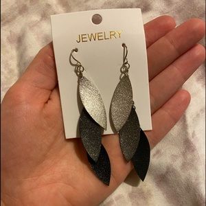 Dangling earrings.
